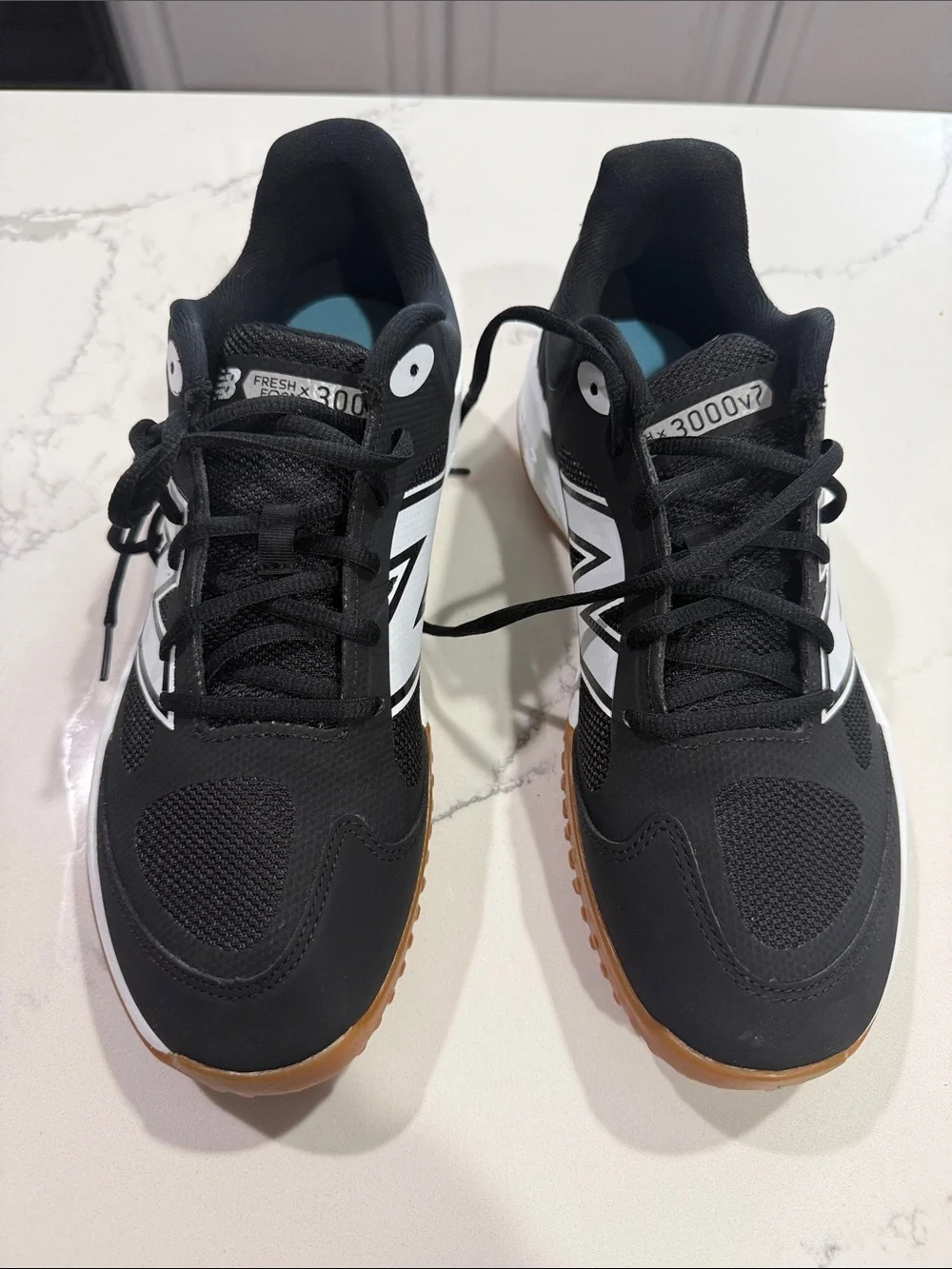 New Balance Black and White Athletic Sneakers with Gum Sole